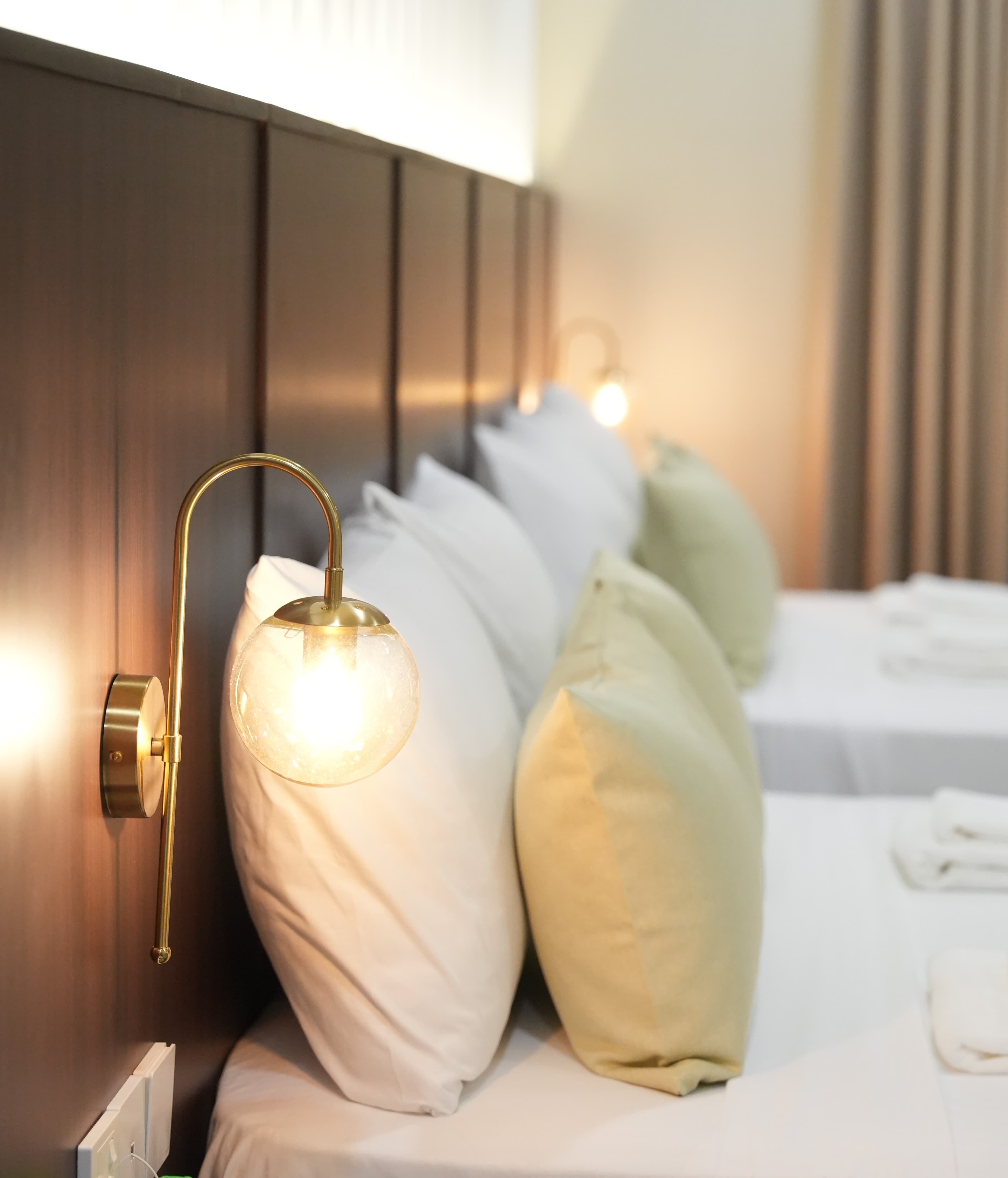 Luxury bedroom interior at Hotel Grand Amanee